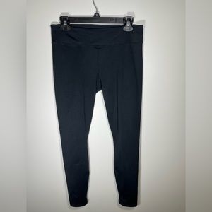 Fabletics black leggings with logo on back size large